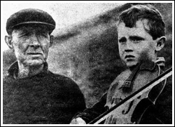 Picture of a young Irish boy with a fiddle.